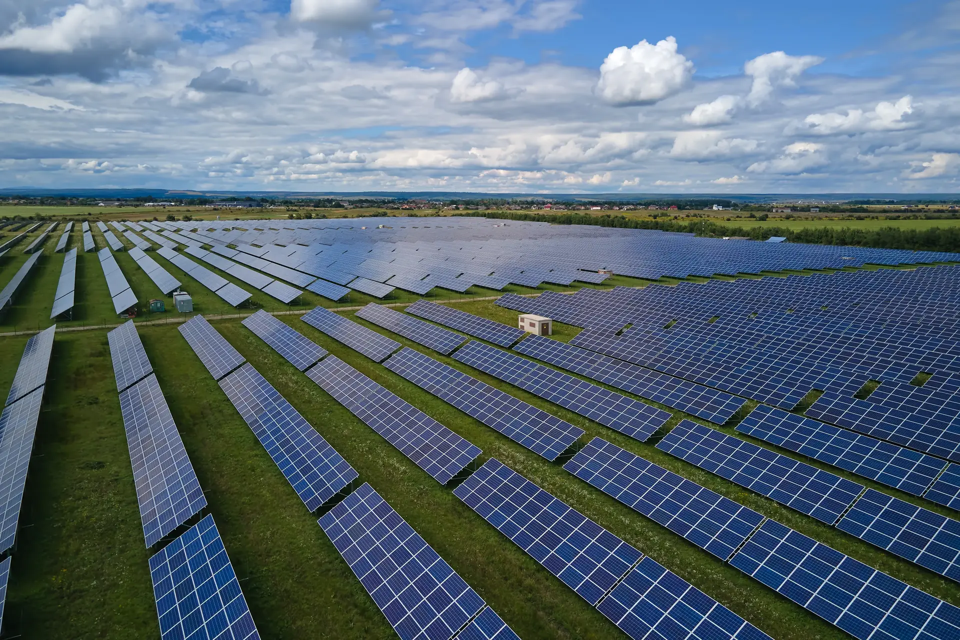 Aerial view of utility-scale solar farm engineered by ElectraGlobe